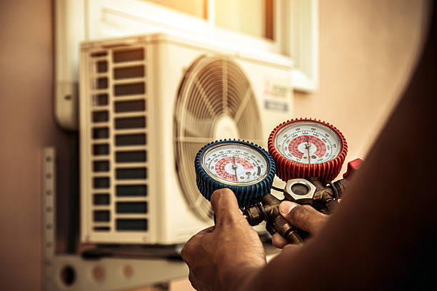Professional Hvac technician working in Mc Queeney, TX